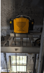 Lift traction machine and motor installed in the machine room