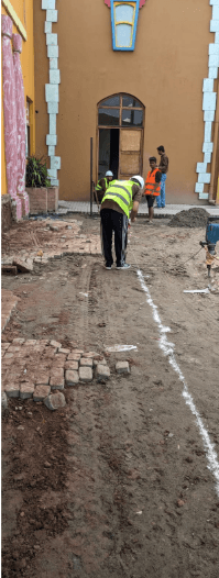 Business complex building with paving and finishing works in progress, Joyland