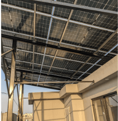 Rooftop solar PV array on steel carport-style mounting