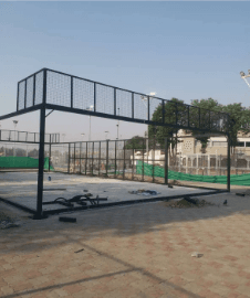 Padel court structures being erected at a multi-court sports facility