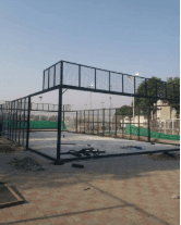 Row of padel courts with synthetic turf under construction