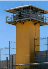 Completed rendered surveillance watch tower with observation cabin and perimeter security fencing
