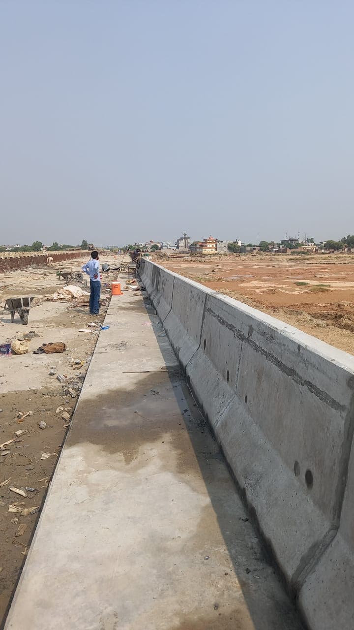 Concrete parapet and road construction works